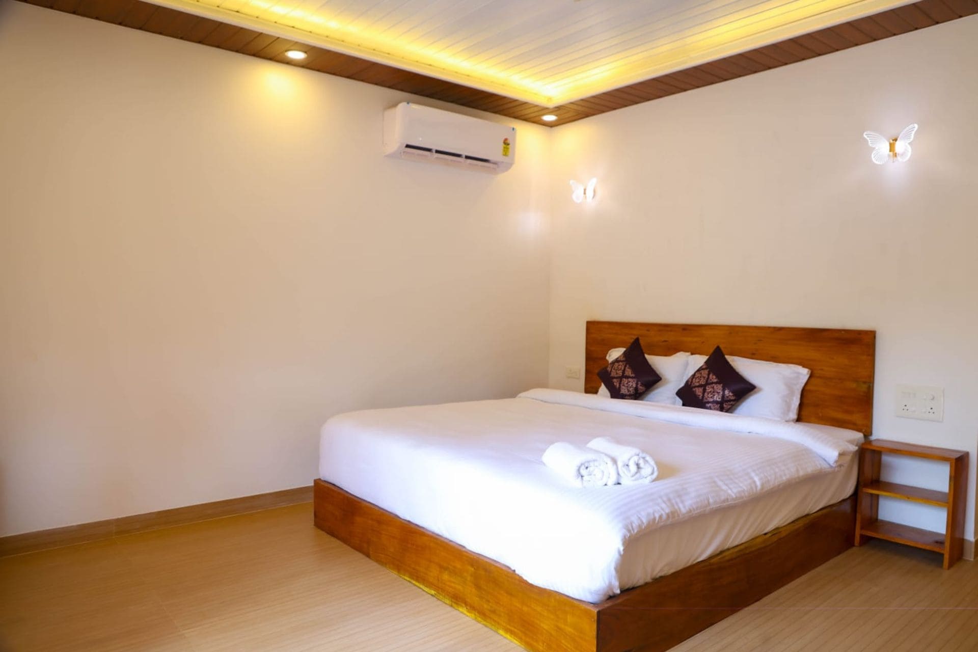 Deluxe air-conditioned room at Blu Butterfly Resort in Agonda with modern amenities and private balcony