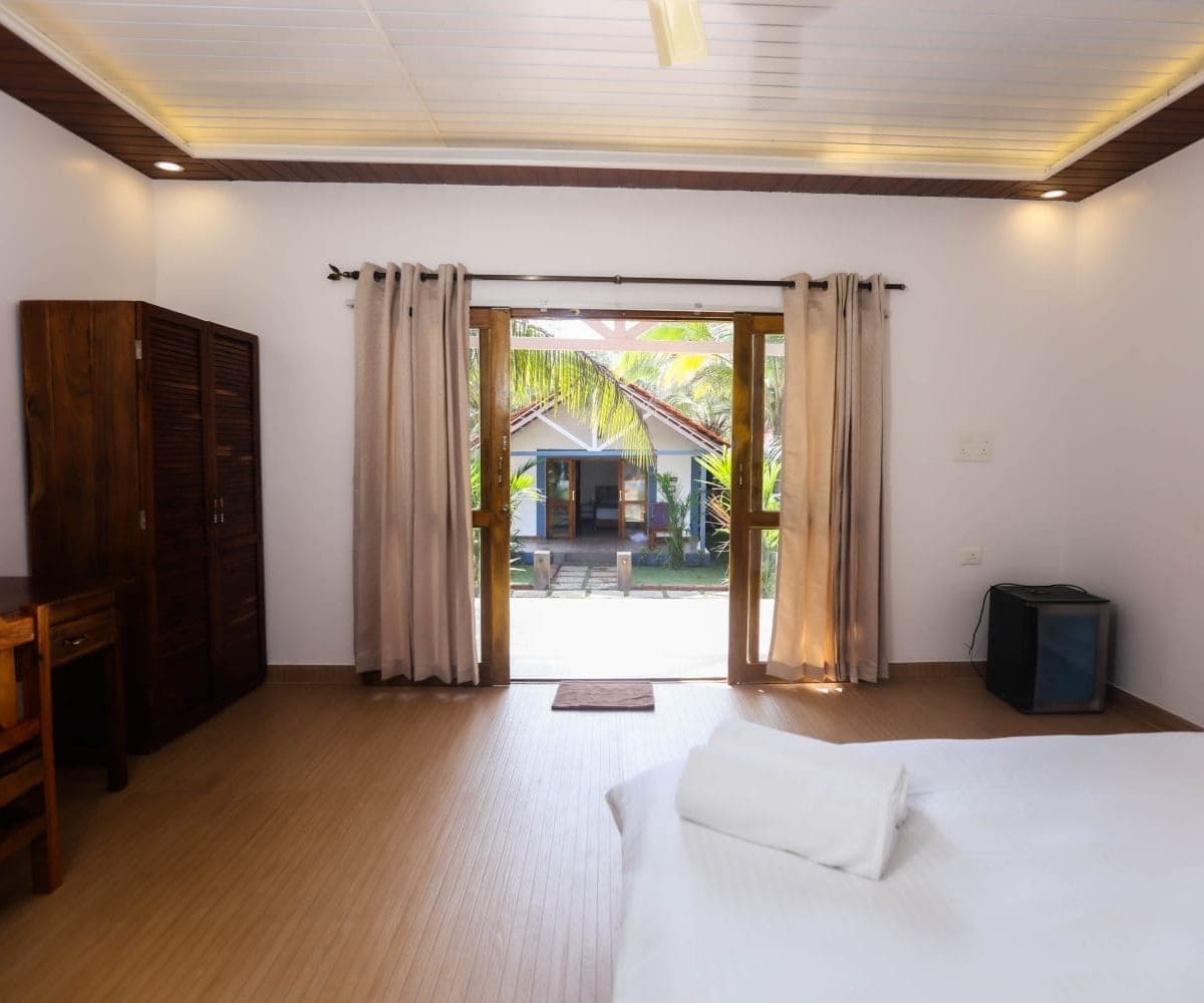 Spacious bedroom inside Luxury Chalet at boutique resort in Canacona South Goa